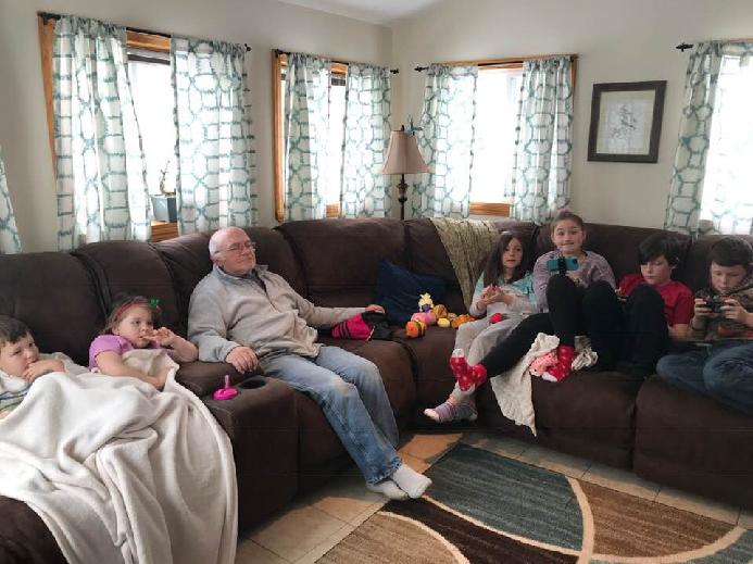 Stephen, surrounded by 6 of his 9 grandchildren - his favorite place to be!