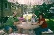 Dad, Mom, Steve, & Julie sitting on my back pation '06
