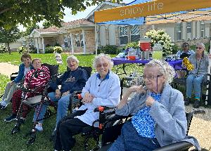 Blu Grotto Memory Care residents at our annual Lemonade Stand Fundraiser!
