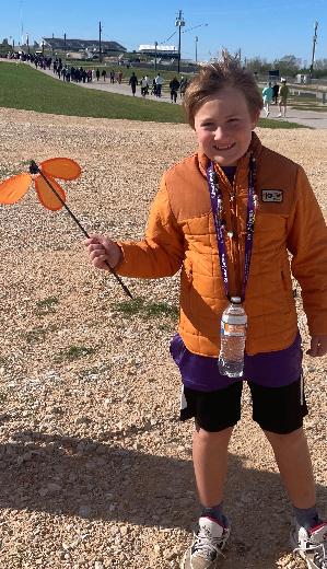 Sam braving the wind at the 2022 Walk to End Alzheimer's!