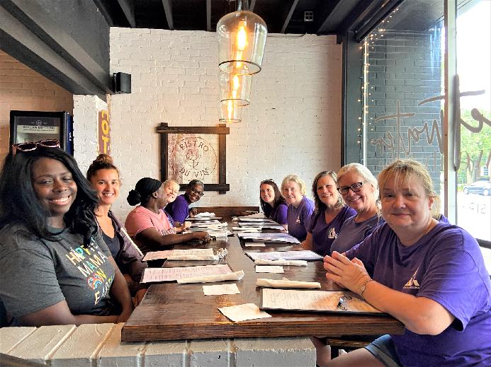 SC Upsilon and SC Alpha Tau sisters reenergize at the Sweetwater after their joint walk in 2023.