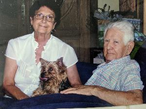 My deceased grandfather, Abel, with my grandmother, Onelia, and their doting dog, Pepi. My grandfather was afflicted with Alzheimer's during the last decade of his long life.