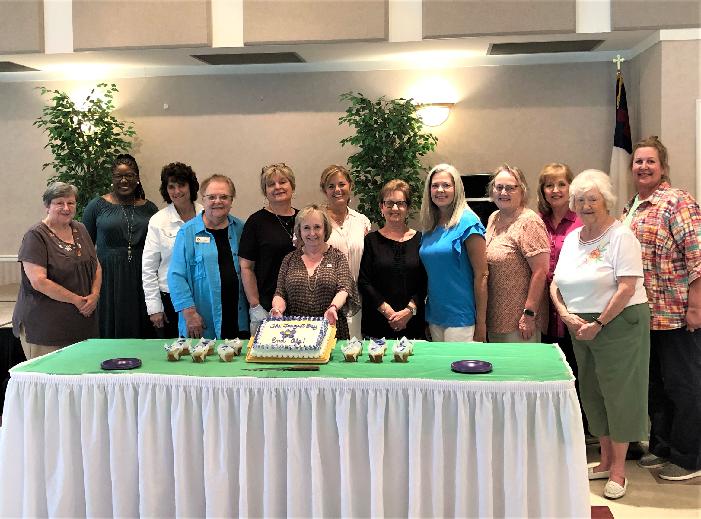 SC Omicron members enjoyed a special cake  for TLD during a previous fundraiser.